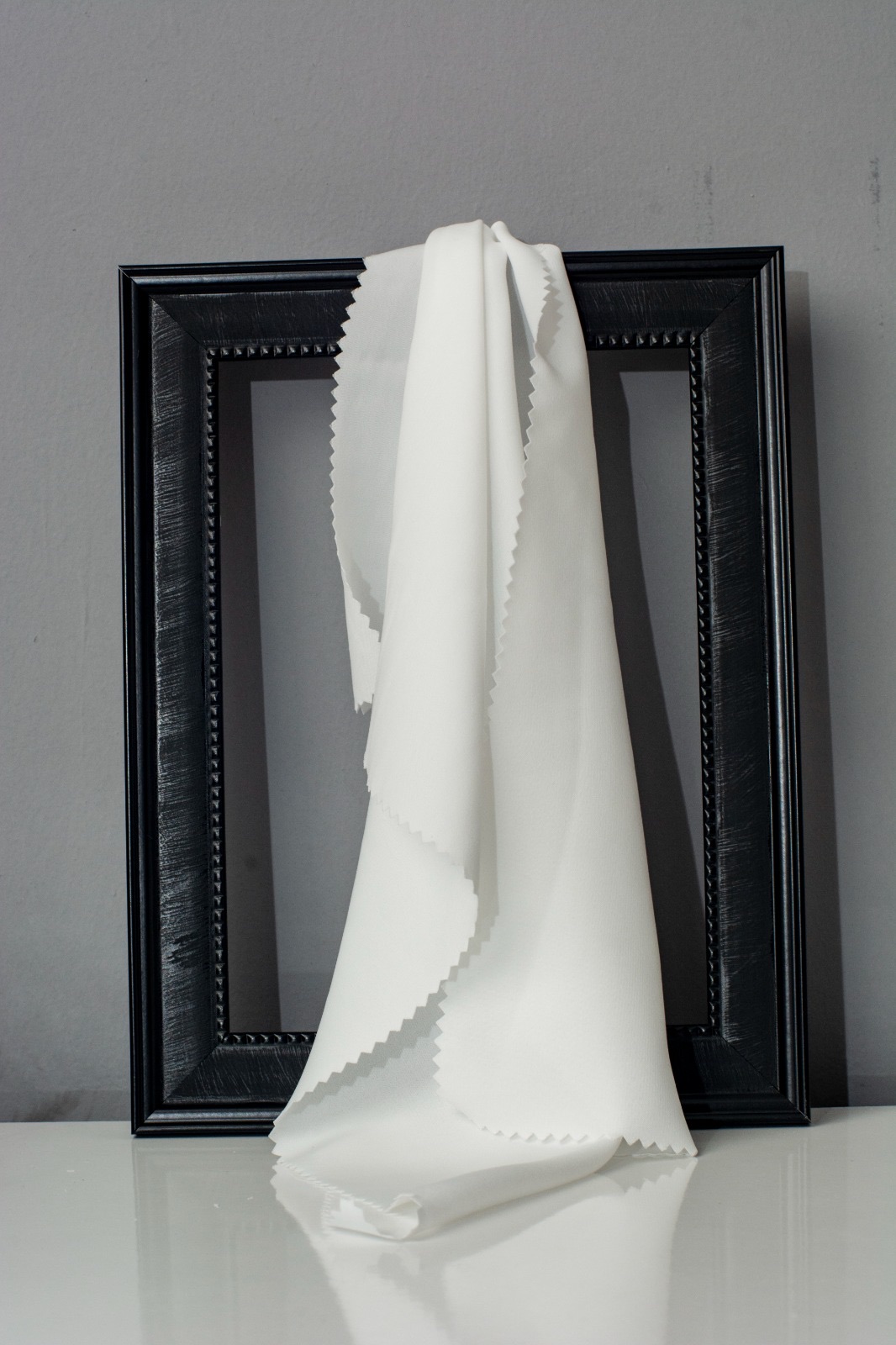 Undyed crepe shown draped