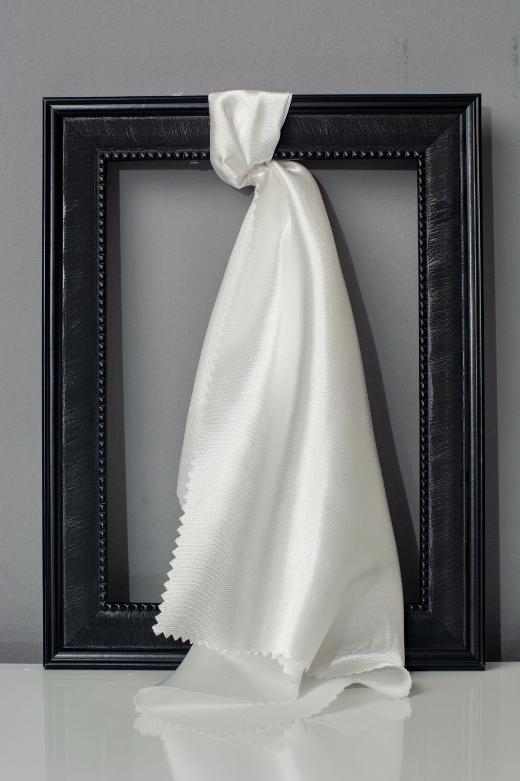 Undyed satin shown draped